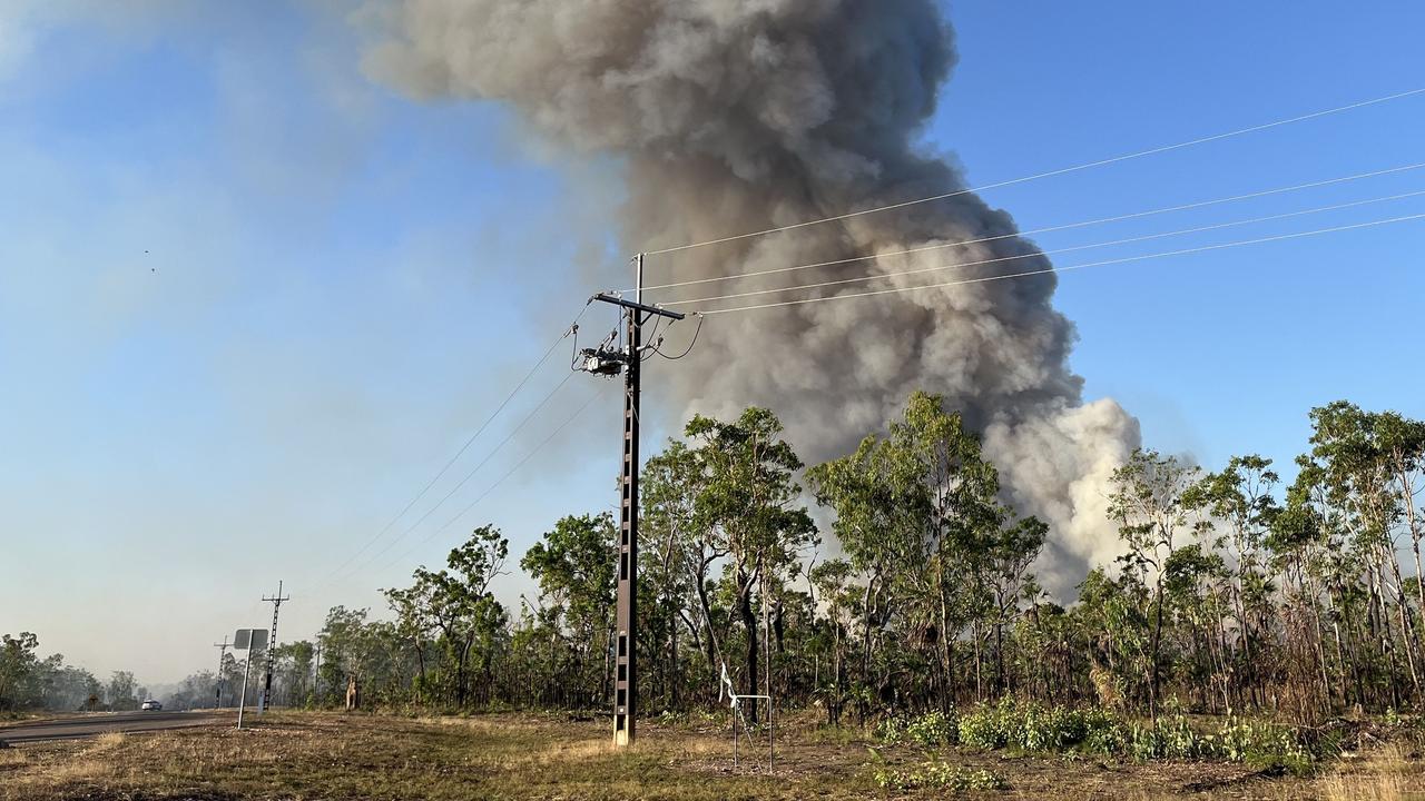 A bushfire burns in woodlands south of Darwin