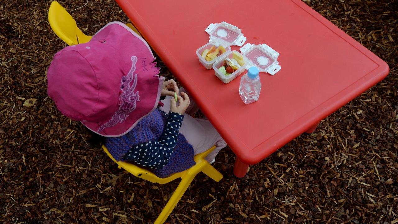 A young child eats her morning tea (file image)