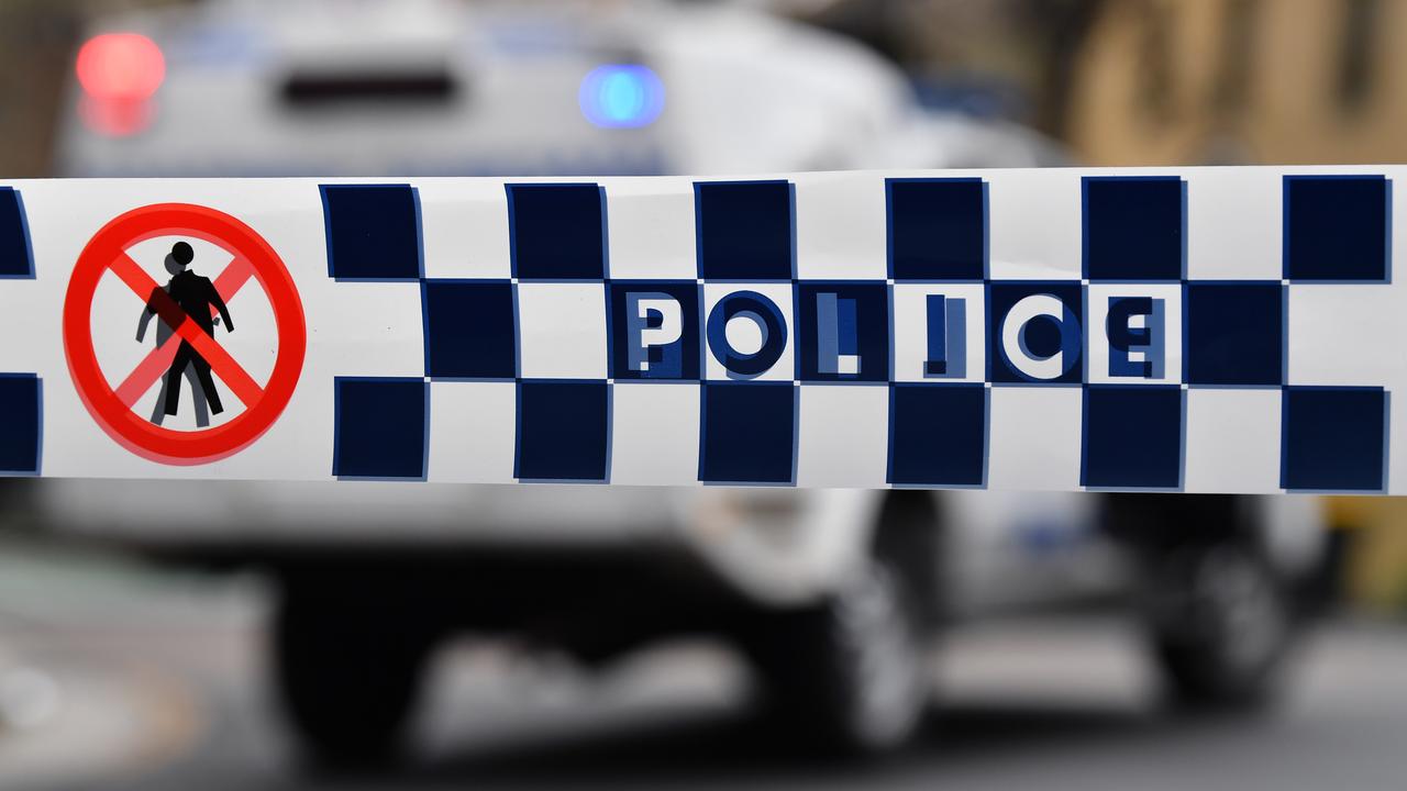Police tape restricts access to a street (file image)