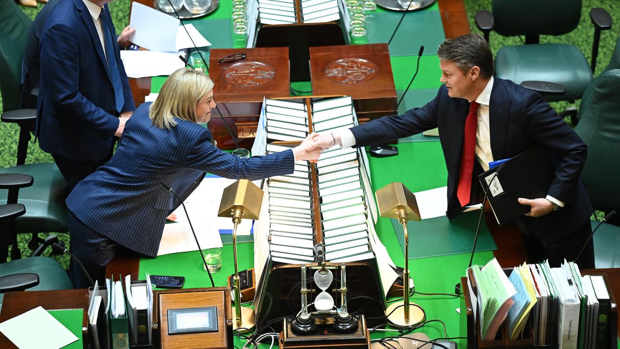 Premier Ben Carroll shakes hands with Opposition Leader Jess Wilson
