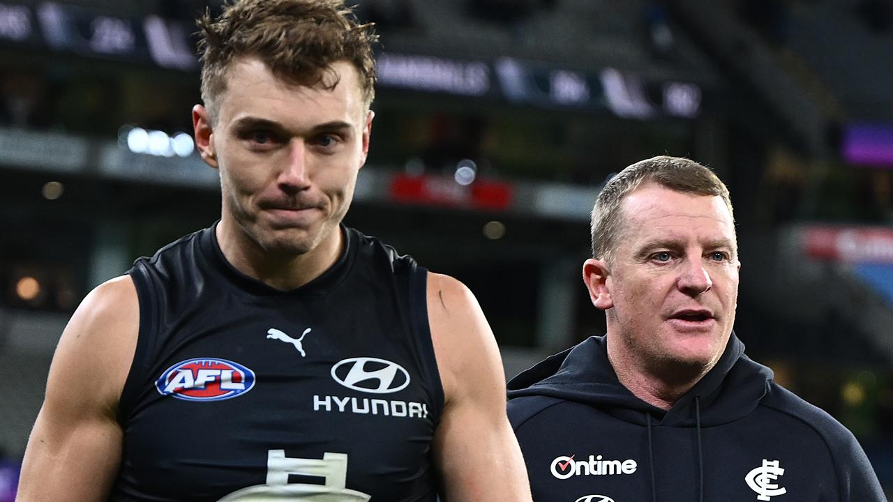 Patrick Cripps and Michael Voss.