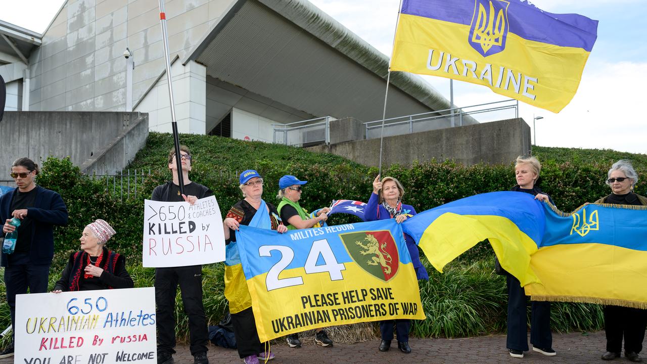 Protesters outside Sydney Olympic Park's aquatic centre