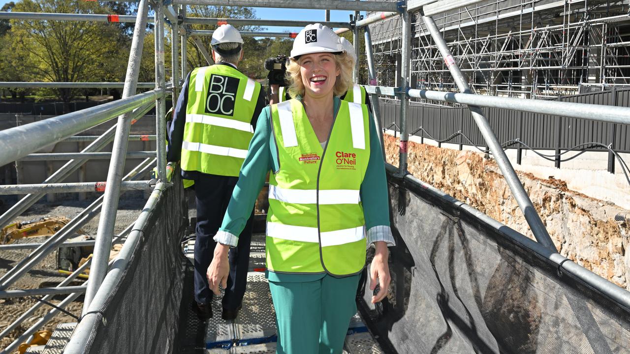 Clare O'Neil visits an apartment construction site.