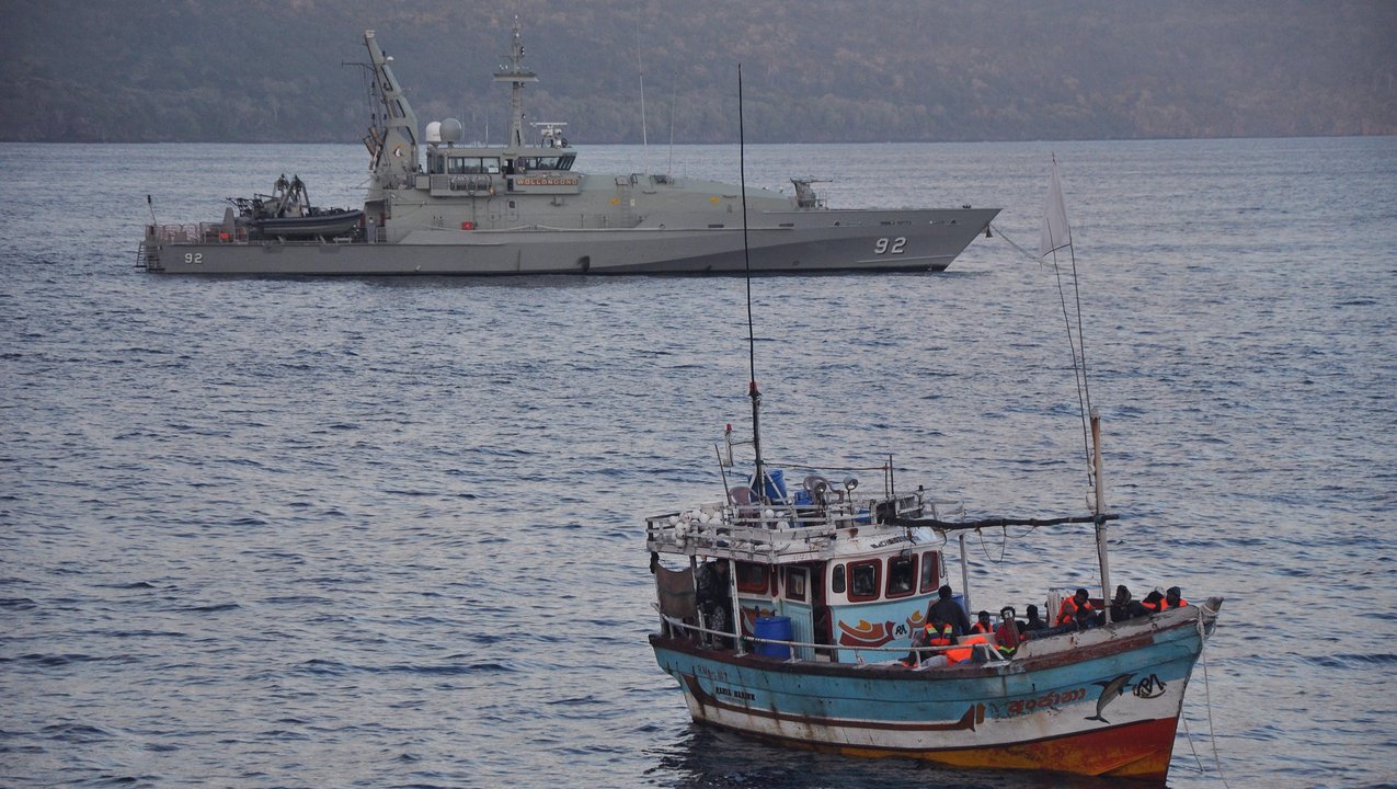 Asylum seekers arriving by boat escorted by RAN patrols