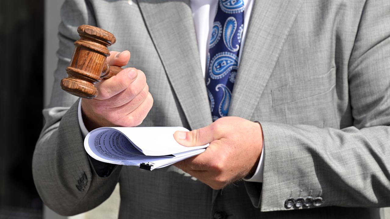 A gavel is held by an auctioneer (file image)