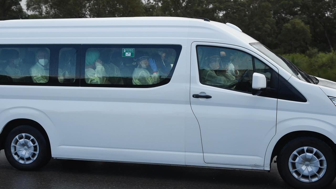 A van carrying Australian travellers to a Perth quarantine facility.