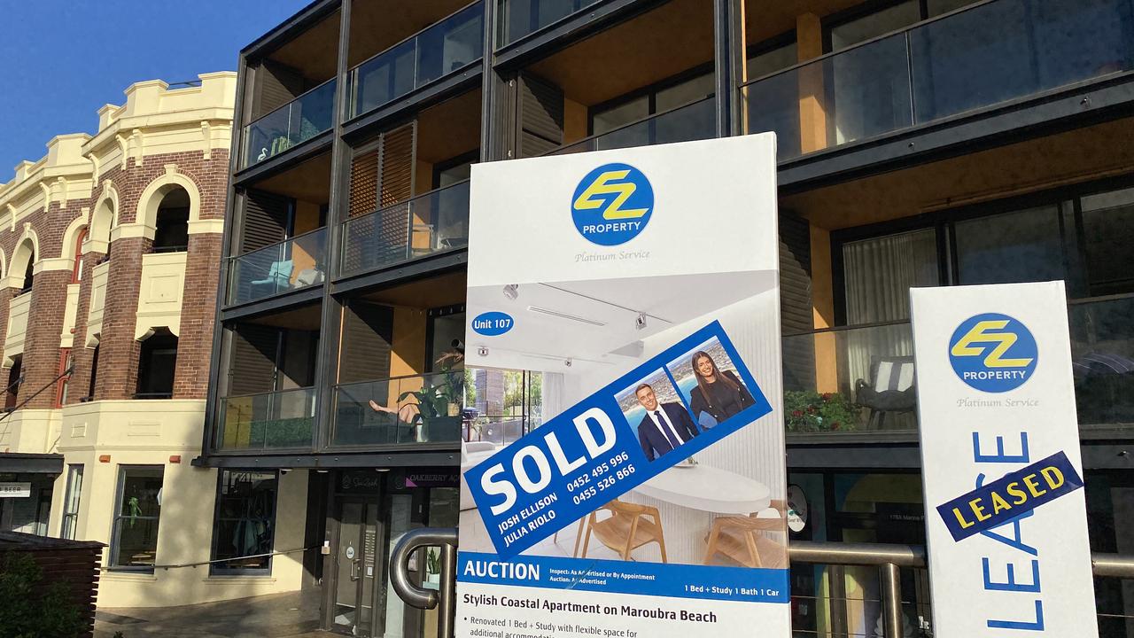 Real estate signs outside an apartment block in Maroubra, Sydney
