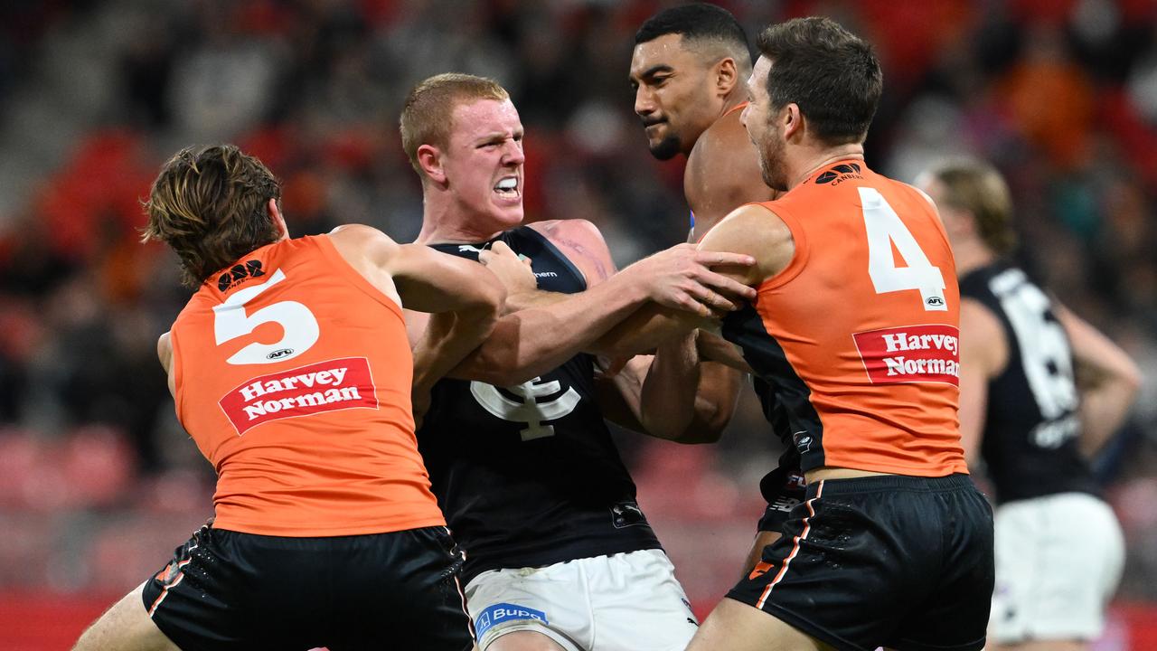 Harry Dean and GWS captain Toby Greene exchanged pleasantries.