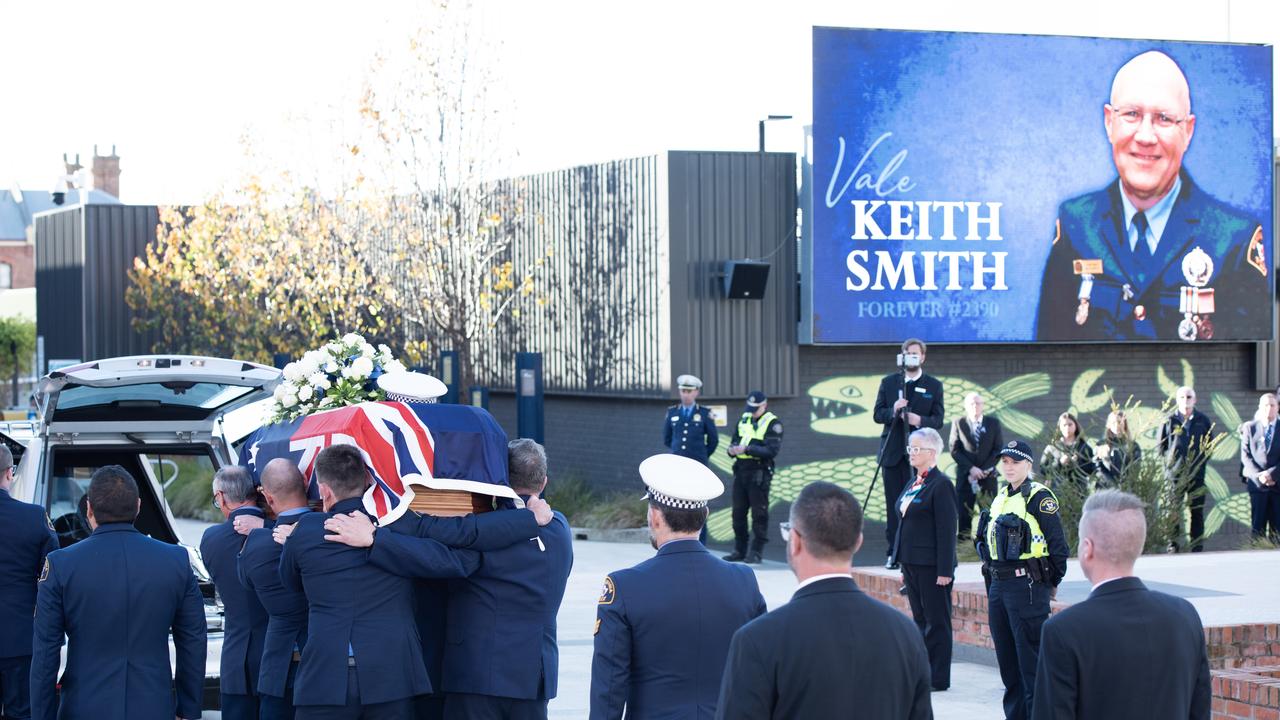 Mourners attend the funeral of Constable Keith Anthony Smith