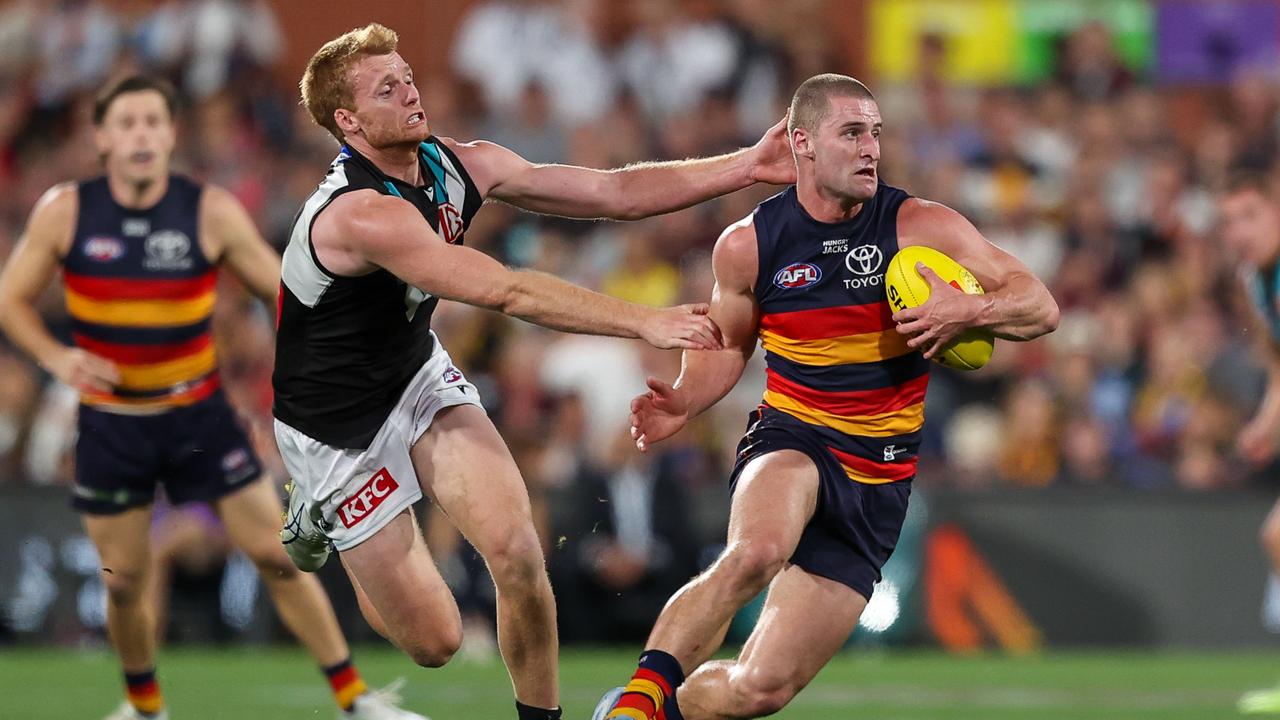Port Adelaide's Willem Drew (left)