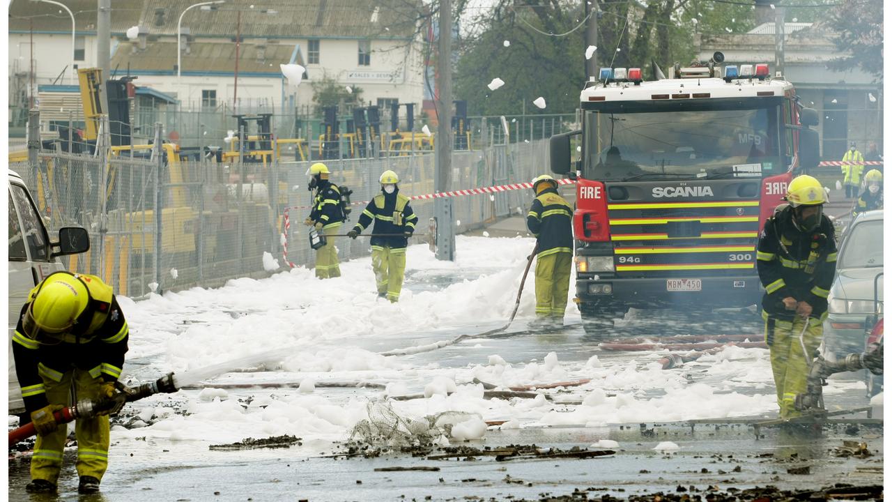 Fire crews spray foam in Yarraville, Melbourne