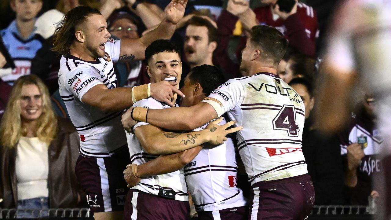 Celebrating Manly players.
