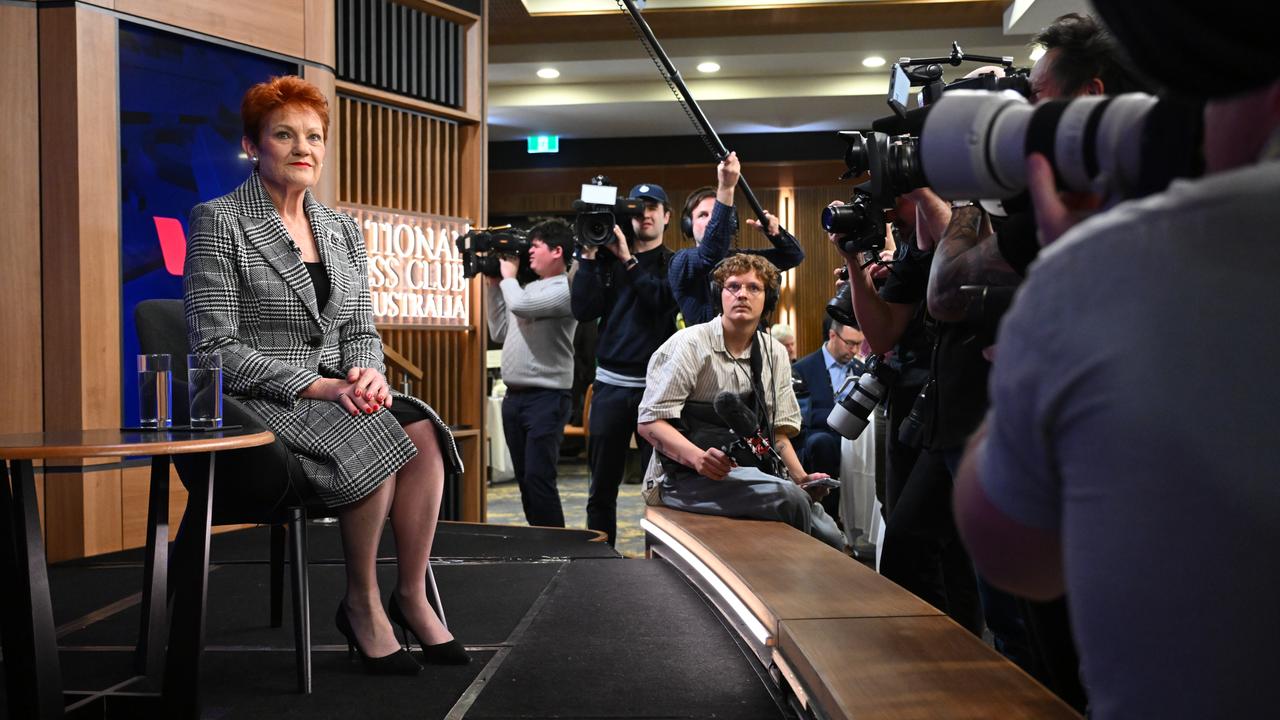Members of the media take photos of One Nation leader Pauline Hanson.
