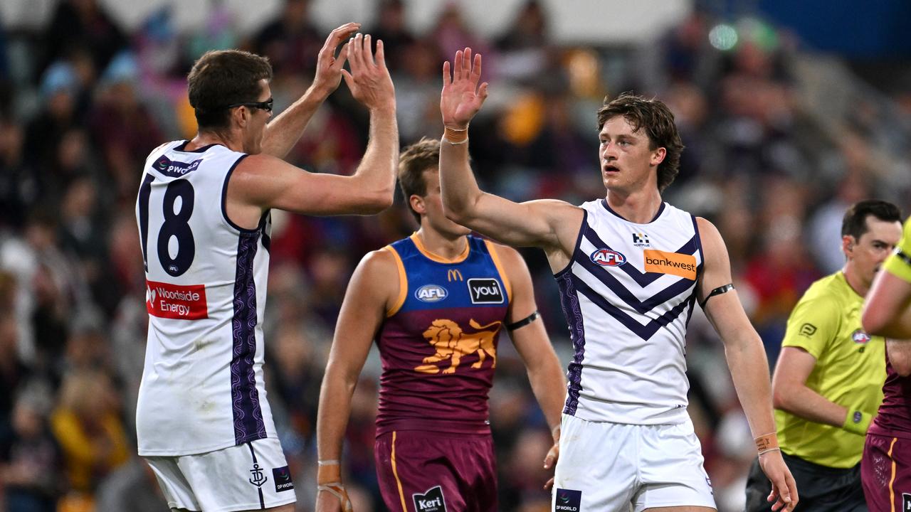 Mason Cox congratulates Jye Amiss on one of his four goals.