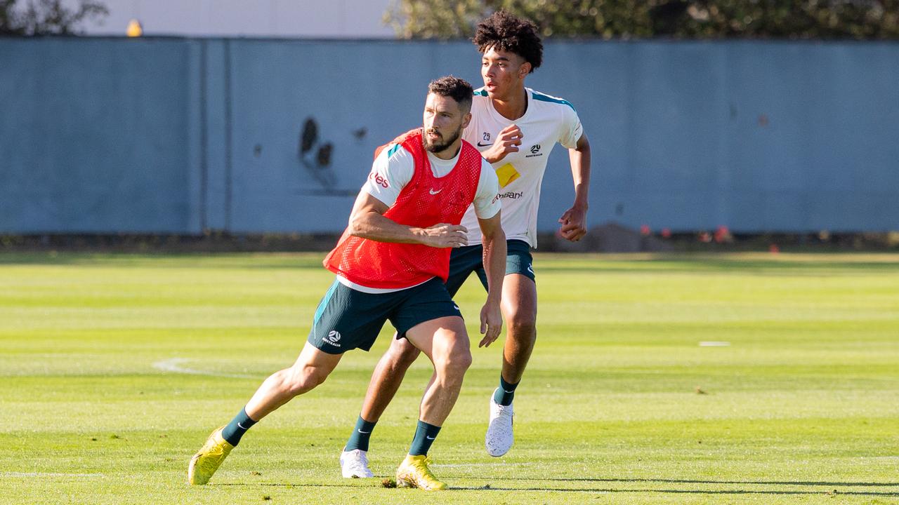(L-R) Mathew Leckie and Lucas Herrington.