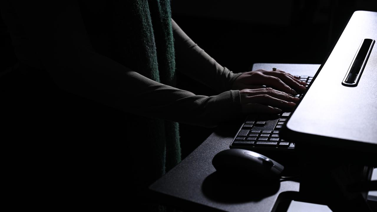 Hands placed on a keyboard (file image)