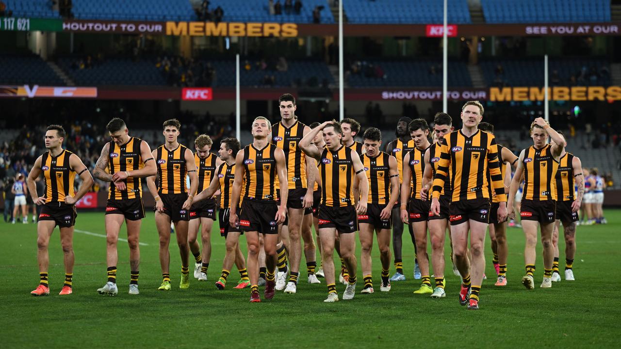 Hawthorn players exit the field