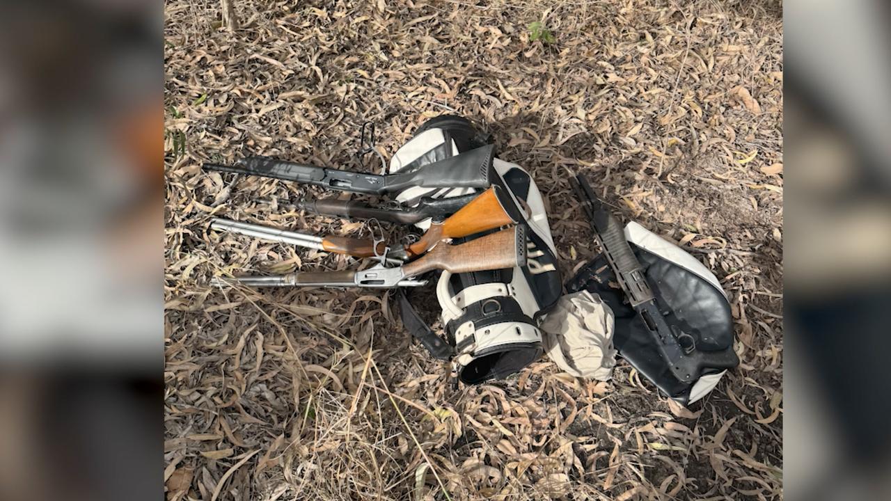 Rifles and a golf bag