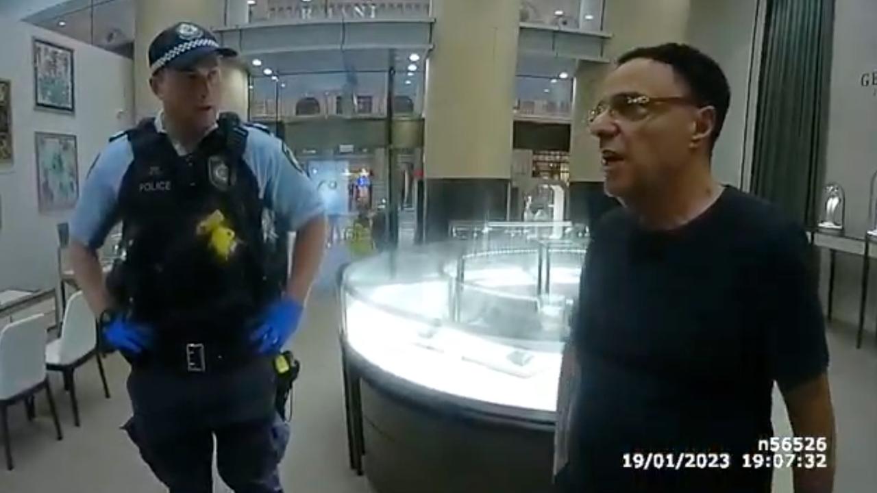 Michel Germani talking to police (file)