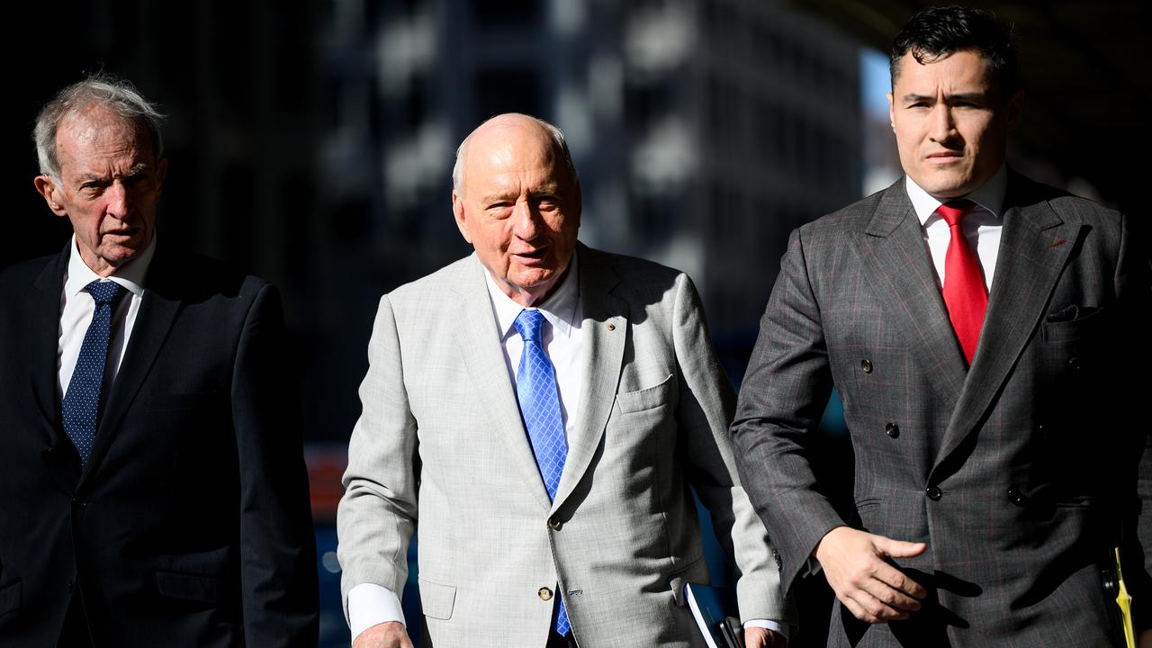 Alan Jones with lawyers