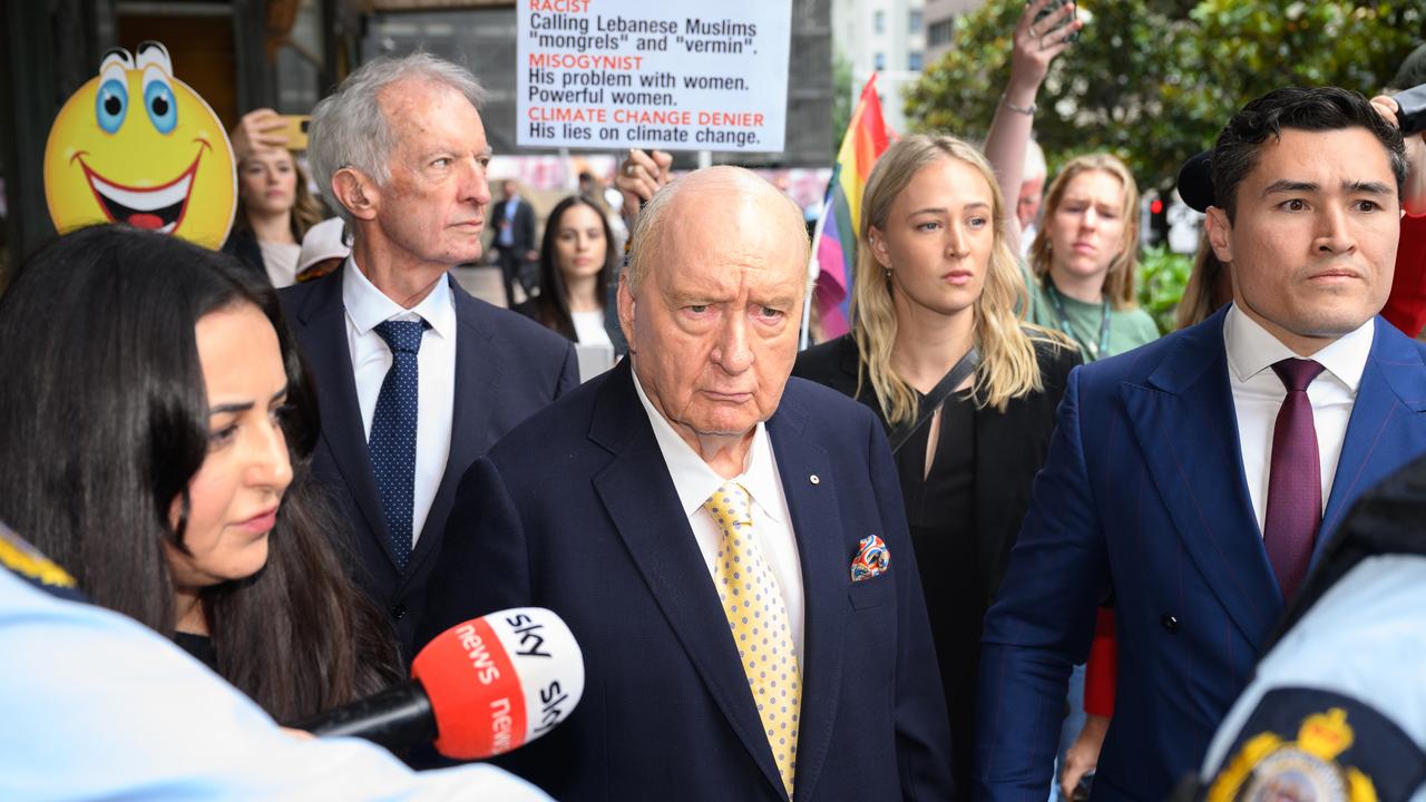 Alan Jones and lawyers (file)