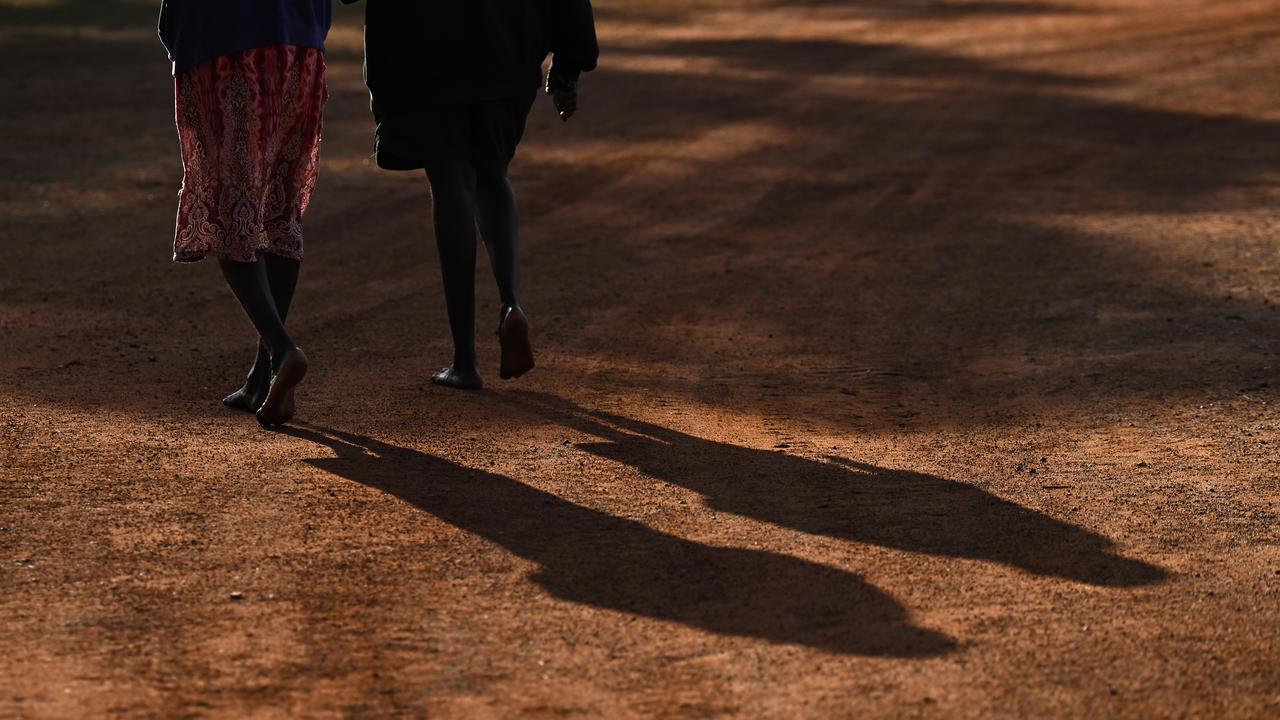 People walking and their shadows (file image)