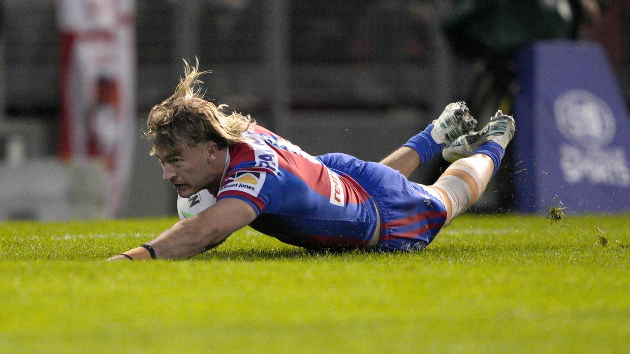 Fletcher Sharpe of the Knights scoring a try