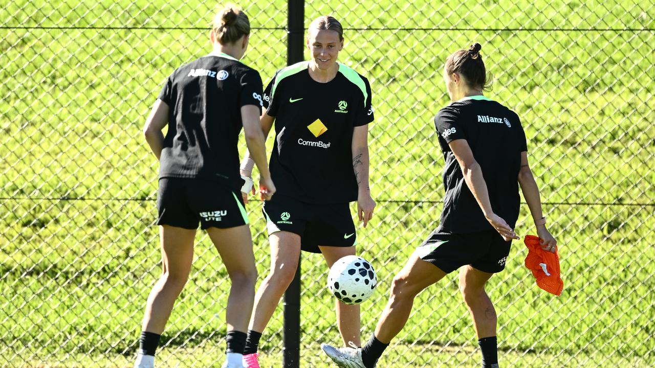 Steph Catley, Emily van Egmond and Caitlin Foord