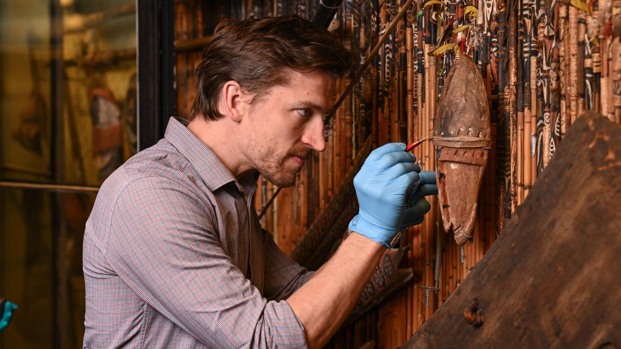 Joshua Brown working on artefacts