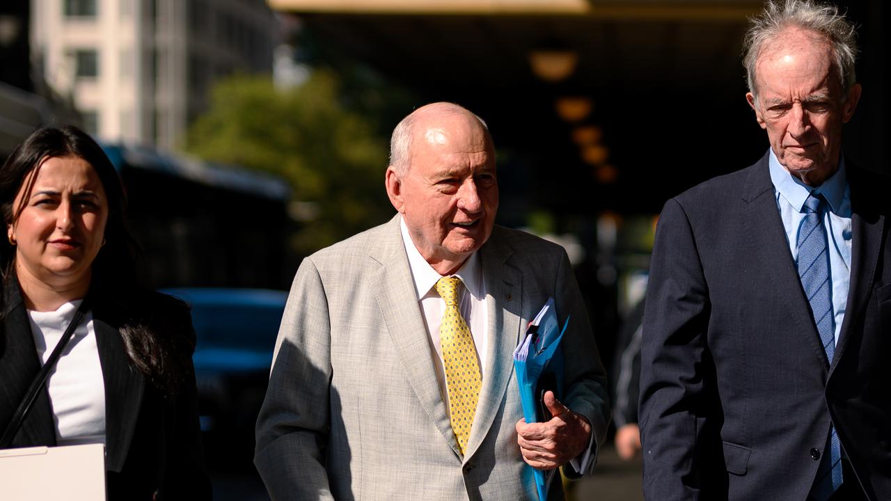 Alan Jones with lawyer