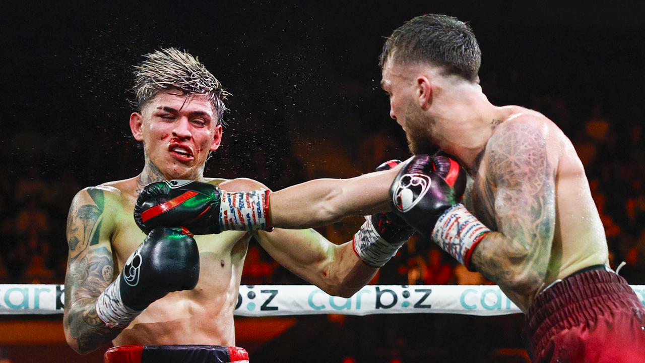 Goodman lands a right on Ruiz.