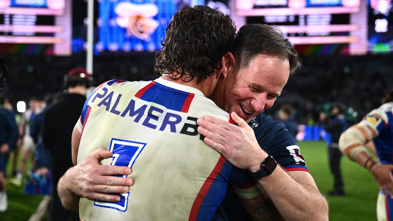 Captain Kalyn Ponga and coach Justin Holbrook embrace