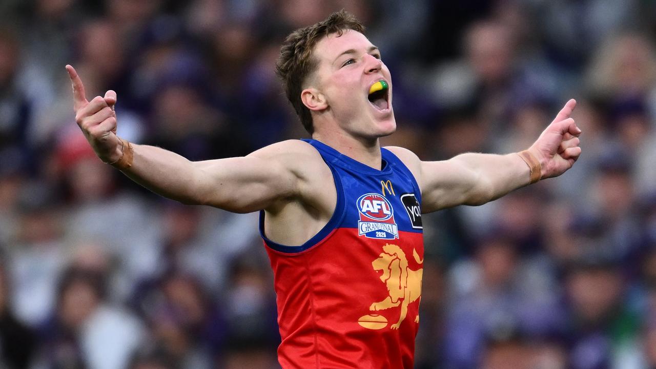 Logan Morris of the Lions celebrates 