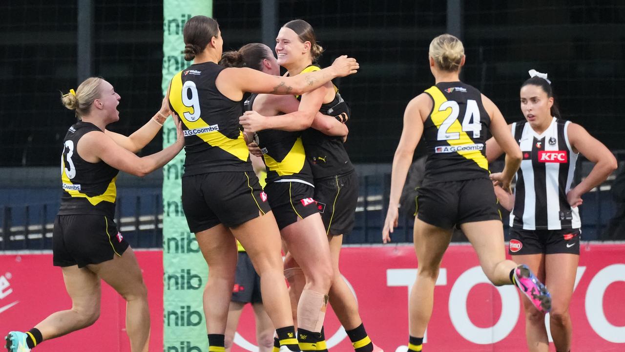 Olivia Wolmarans was swamped by Richmond teammates.