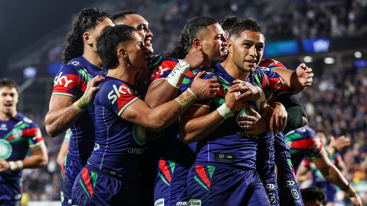 Warriors players celebrate.