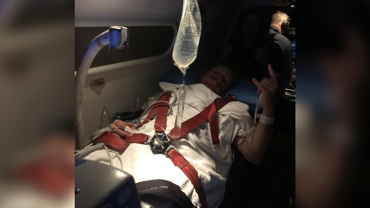 Farmhand Patrick Blomfield on a RFDS emergency flight