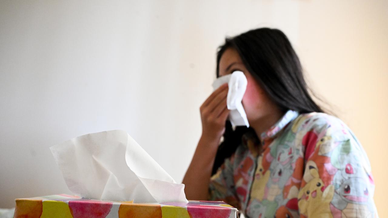 Woman uses tissue