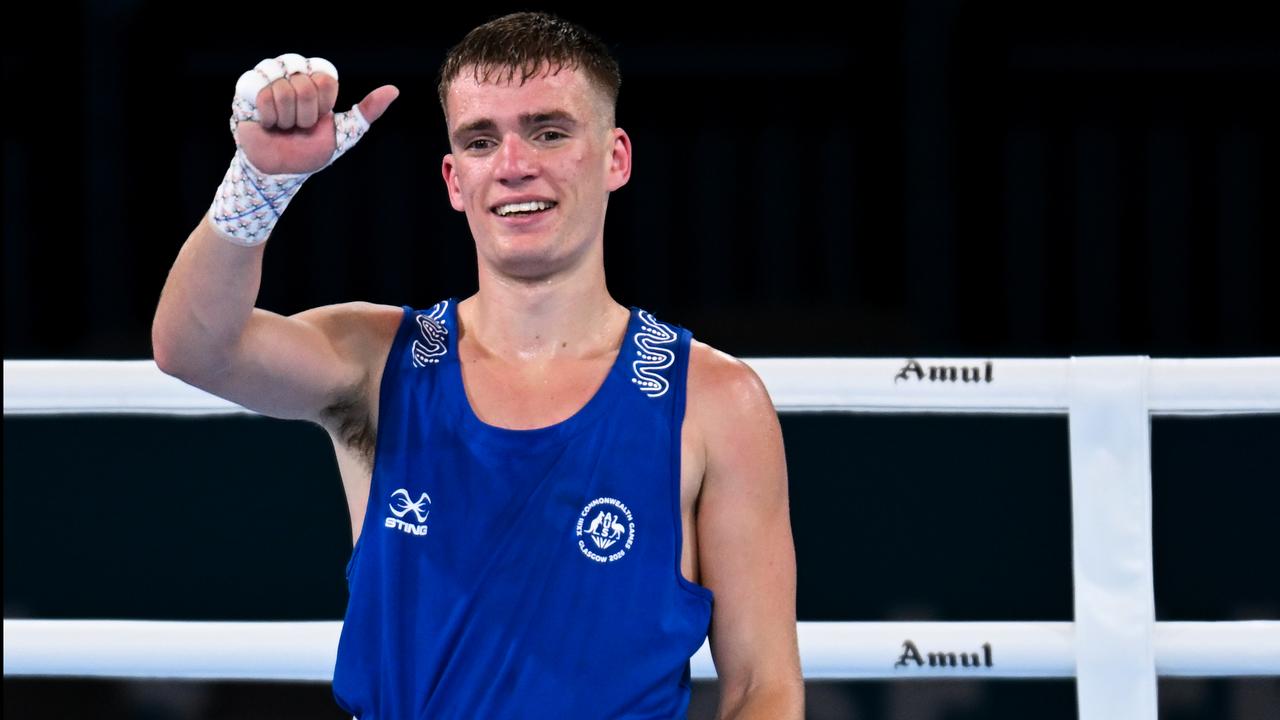 Jacob Cassar of Australia (blue) c