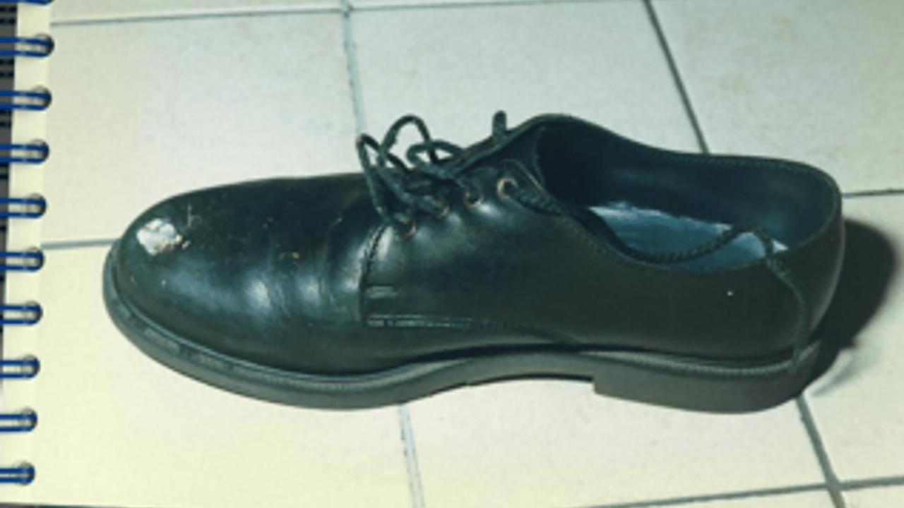 Bullet hole in shoe (file)