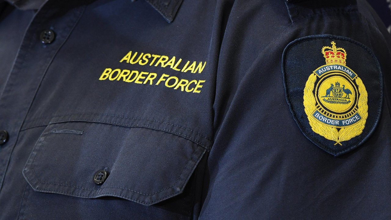 Australian Border Force crest and uniform