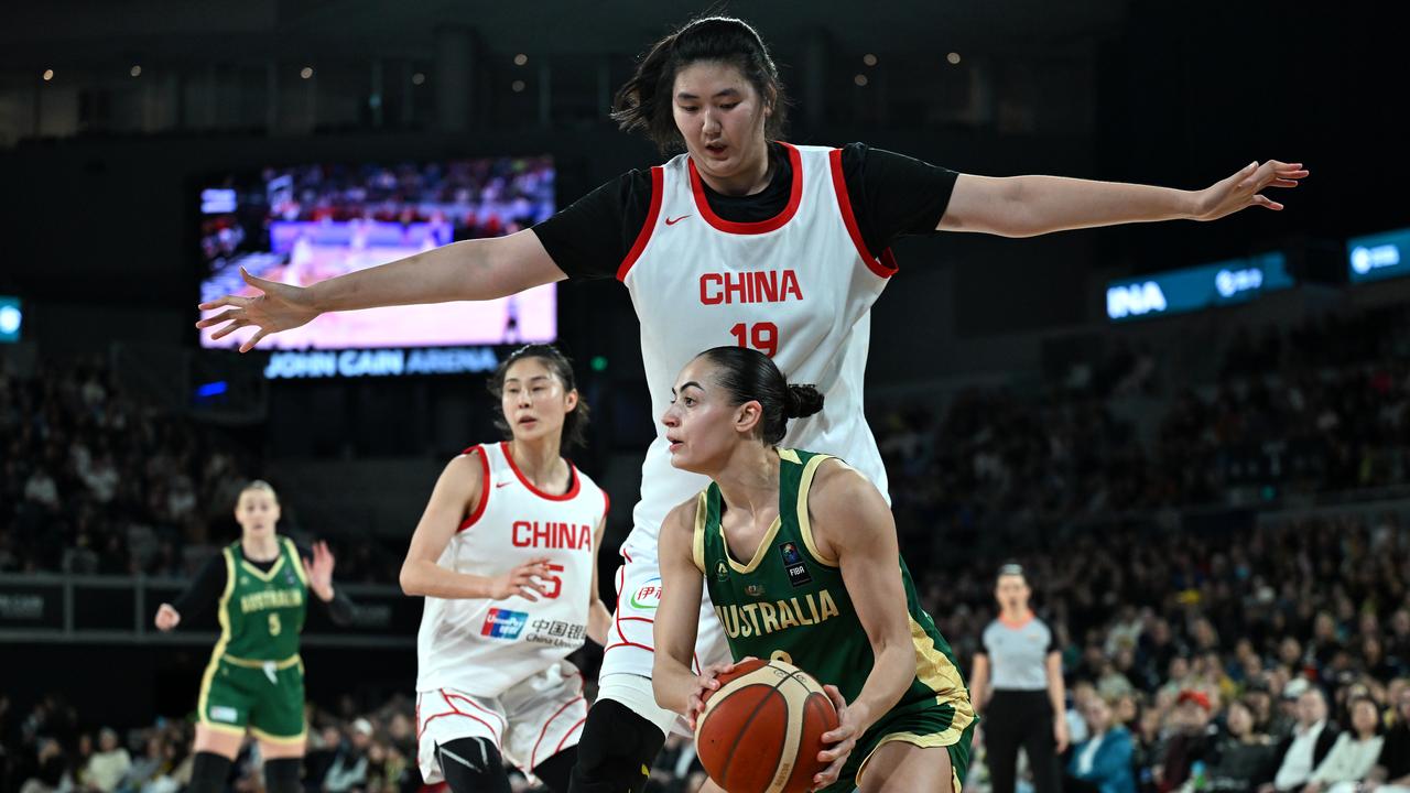 Maddison Rocci of Australia (right) in action against Ziyu Zhang