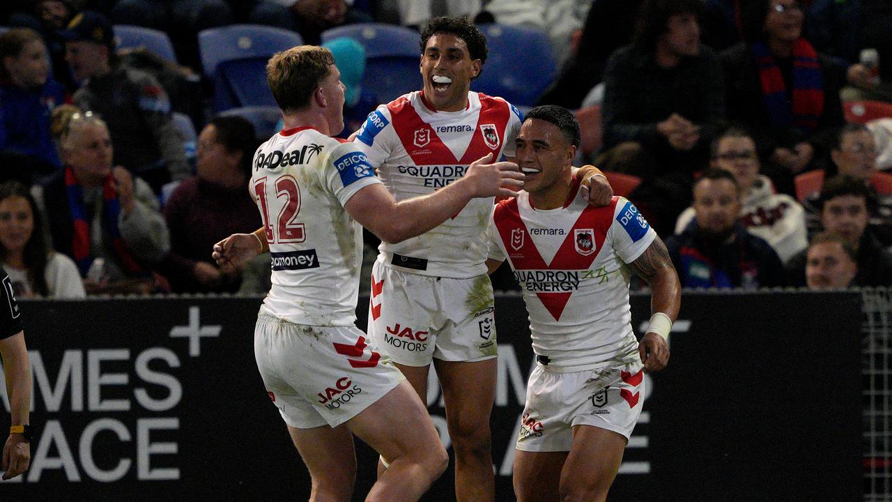 Dragons celebrating after Tyrell Sloan scored a try