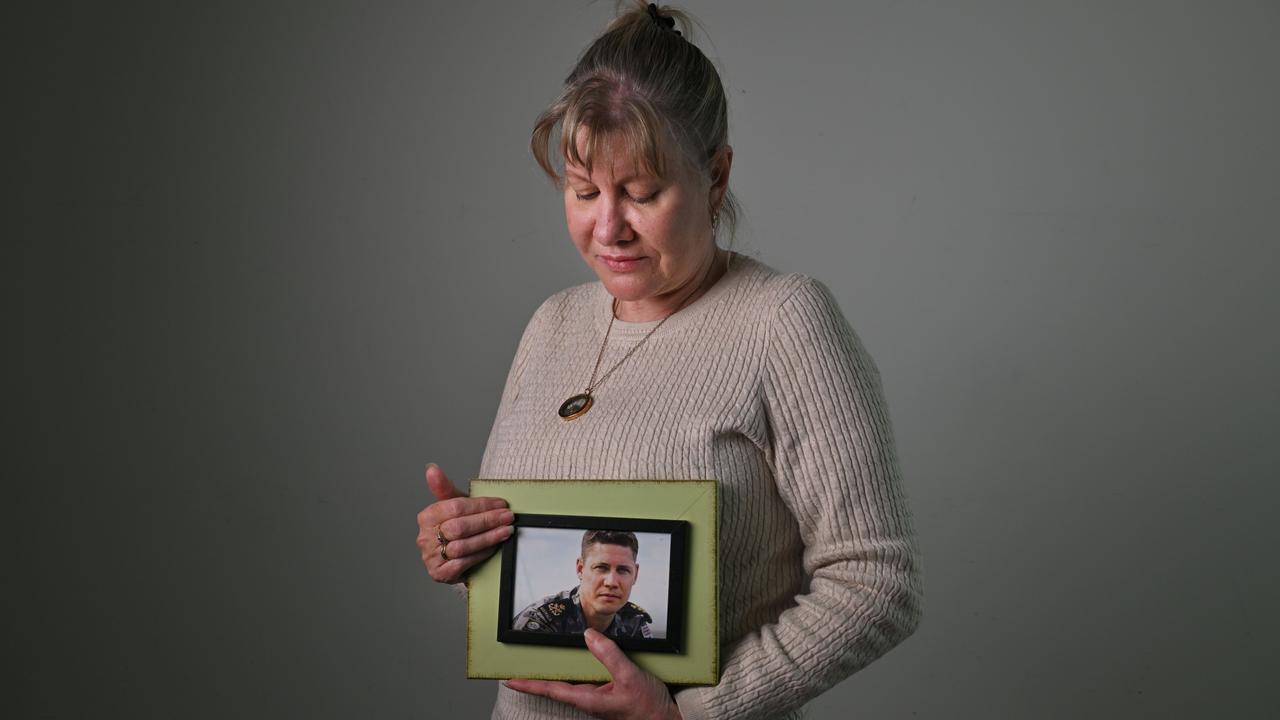 Julie-Ann Finney holds a photograph of her son David