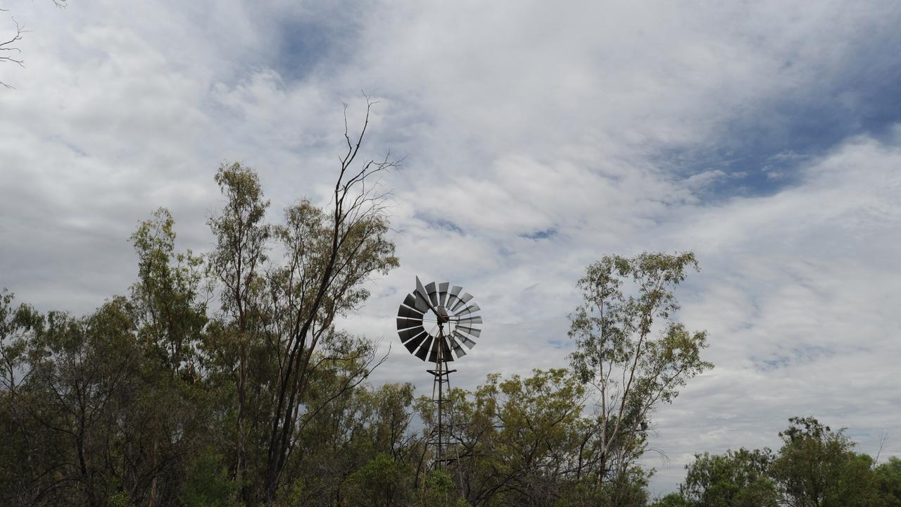 A windwill on the banks of the Barwon River near Brewarrina