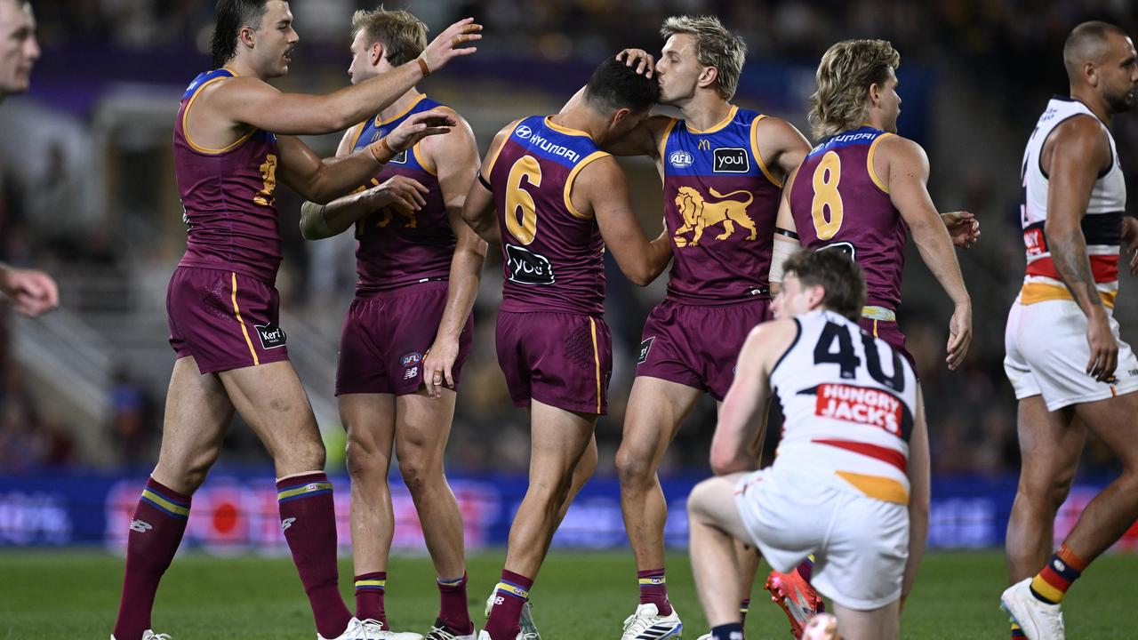 Celebrating Brisbane Lions players.