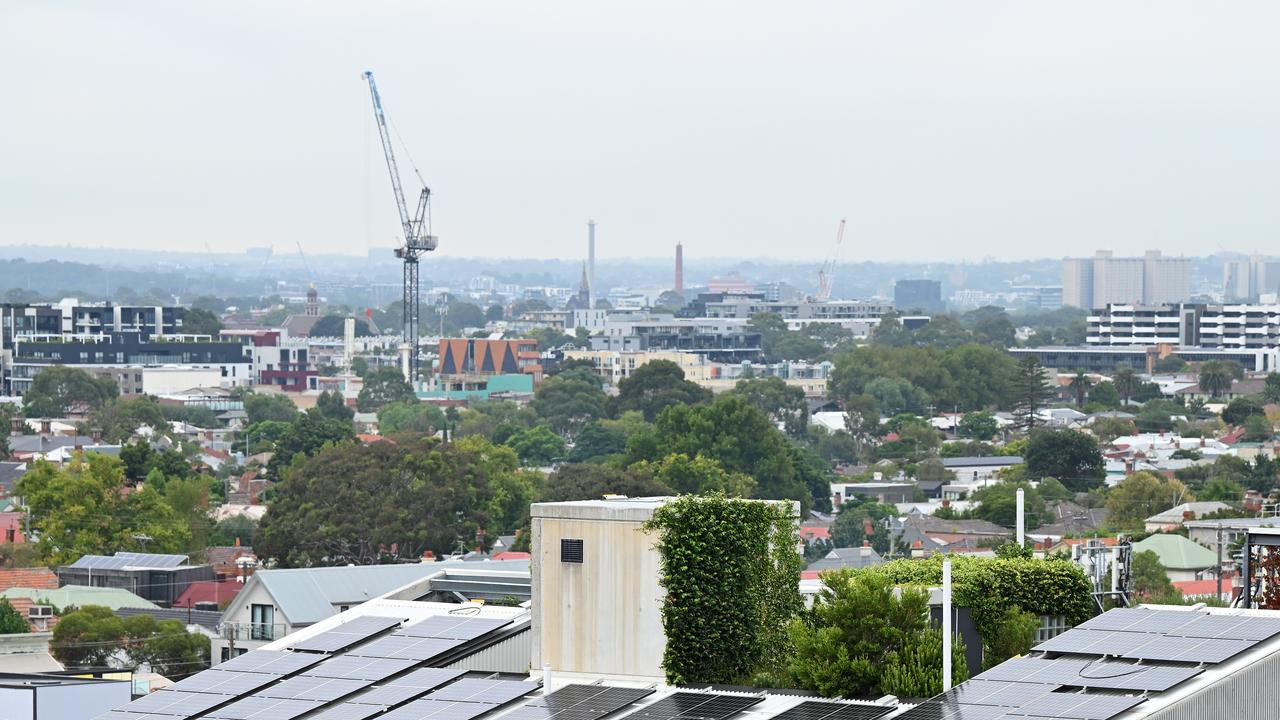 Apartment building with solar panels on roof