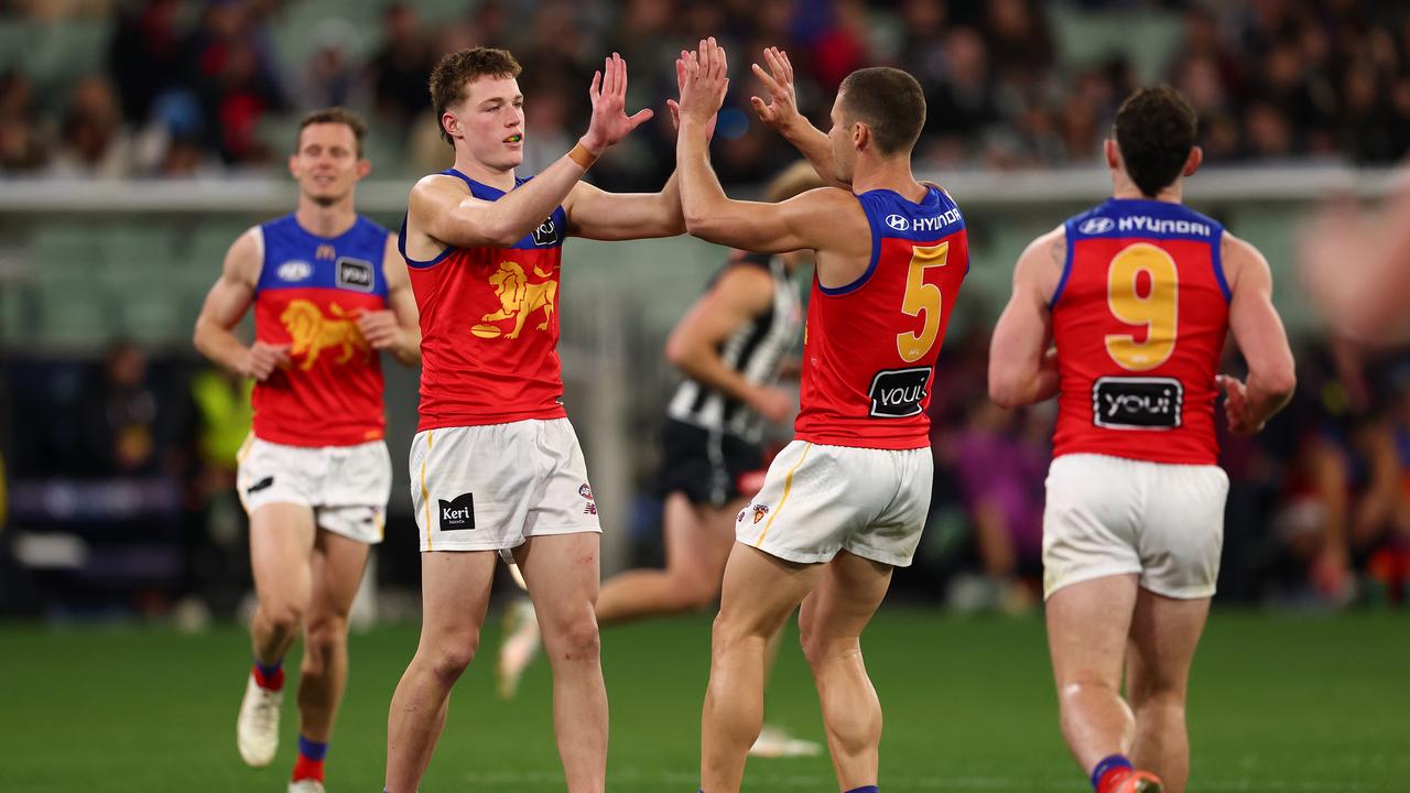 Logan Morris is more than happy to stay in the Lions' den.