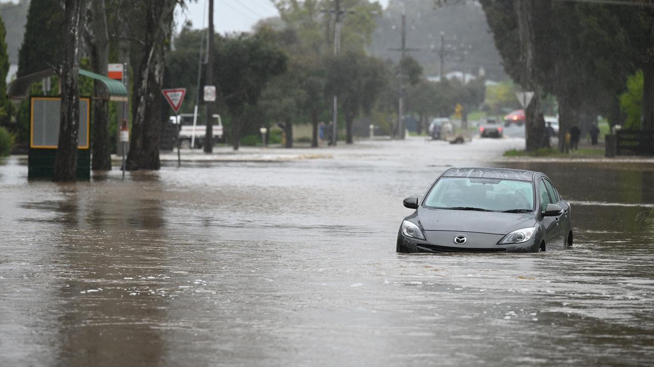 A partly submerged car in floodwaters (file image)