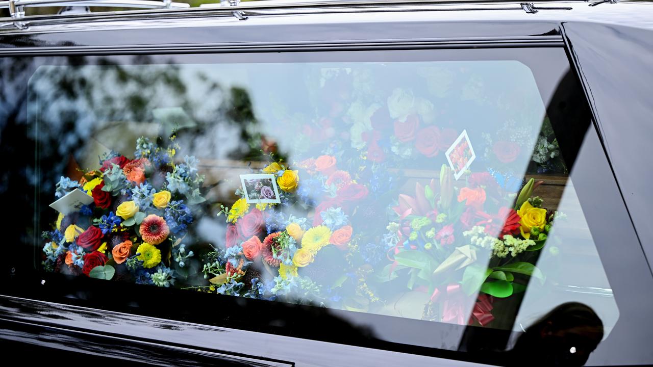 floral arrangements in hearse