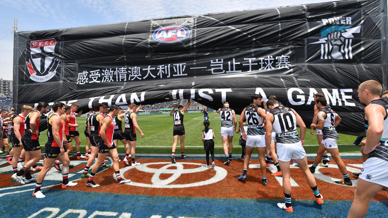St Kilda and Port Adelaide banner.